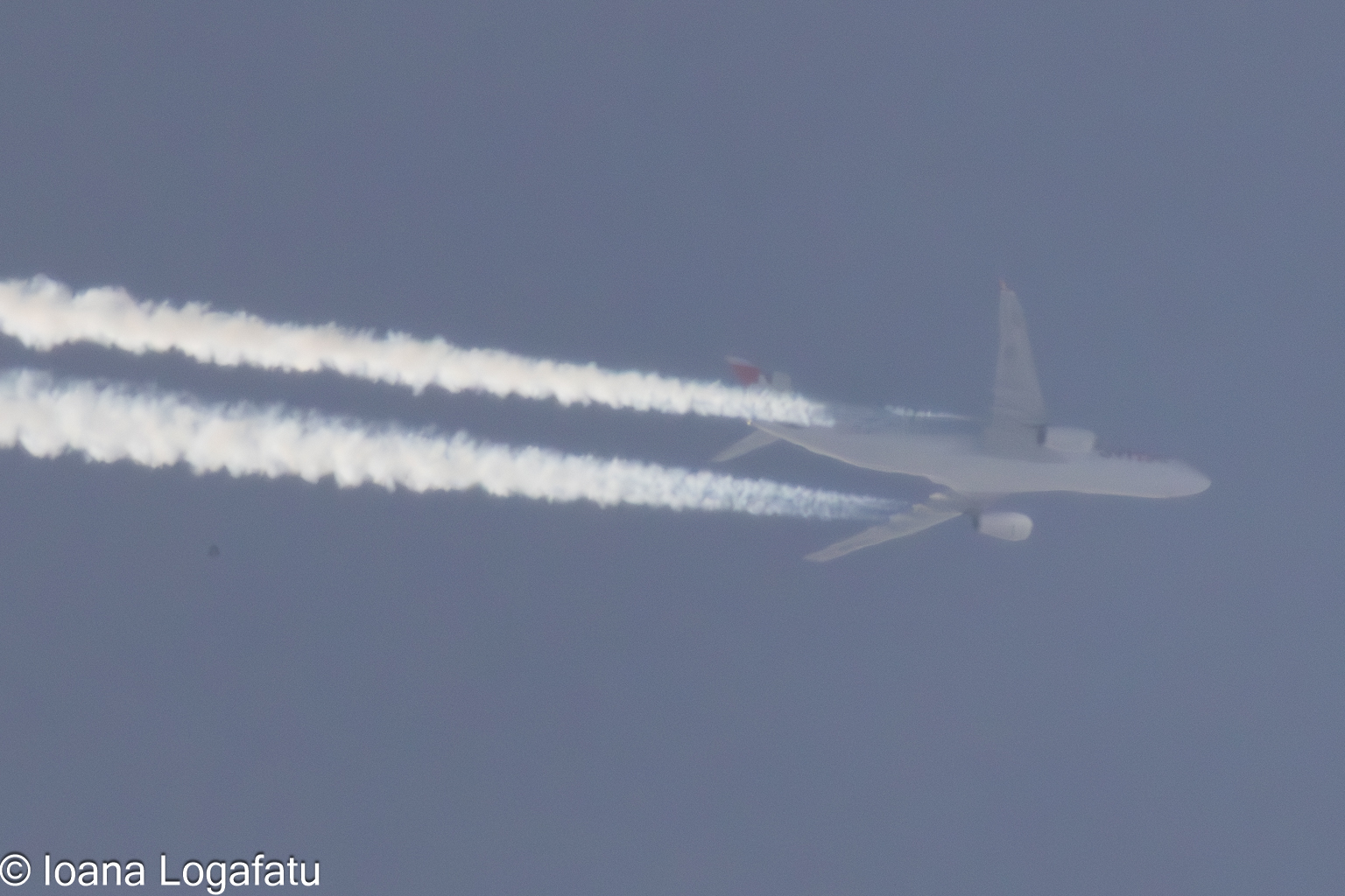 Majestic plane soaring through the cloudy sky
